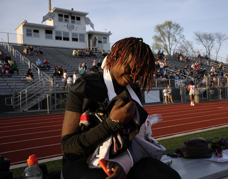 Sports Picture Story - Second Place, “Columbus Chaos”Makyah Smith (2) of Columbus Chaos sobbs and clutches her jersey after breaking her arm during a game against the Derby City Dynamite. (Barbara J. Perenic / The Columbus Dispatch)