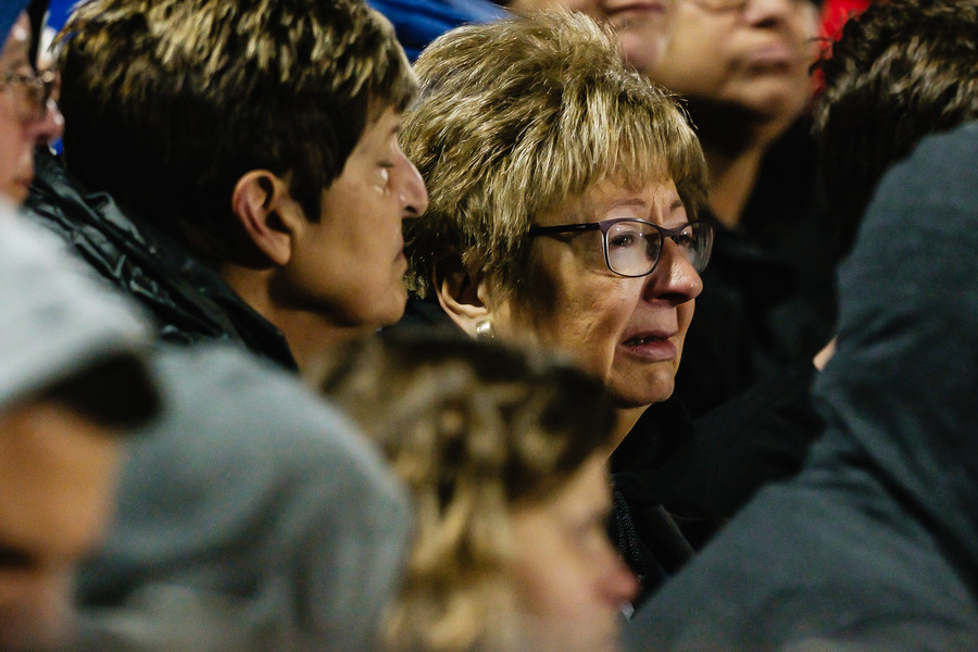 News Picture Story - 1st, “Tuscarawas Valley Bus Tragedy”A woman sheds tears  during the community prayer vigil, Tuesday, Nov. 14 at the Tuscarawas Valley Schools football stadium in Zoarville, Ohio. (Andrew Dolph / The Times Reporter)