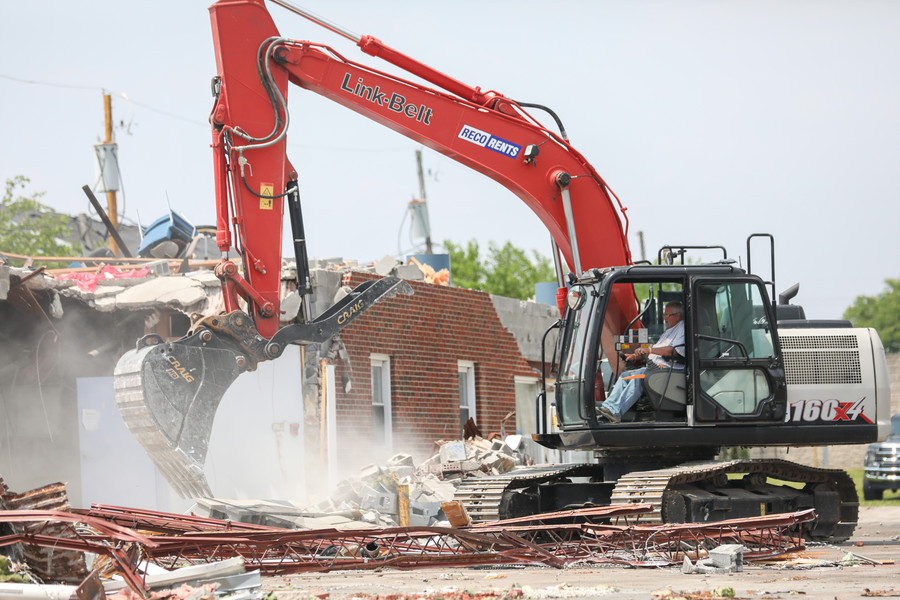 News Picture Story - 2nd, “Tornado”A worker for Klumm Brothers cleanups debris from the destroyed ProMedic lab on Saturday, June 17, 2023 in Toledo. (Jonathan Aguilar / The Blade)