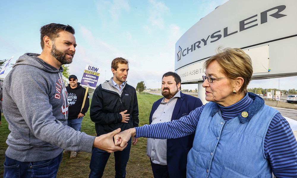 News Picture Story - 3rd, “UAW Strike”U.S. Sen. J.D. Vance (R., Ohio) and U.S. Rep. Marcy Kaptur (Dem., Toledo) awkwardly greet each other as they cross paths visiting striking UAW members Friday, October 6, 2023, at the Stellantis Toledo Assembly Complex where Jeeps are made in Toledo, Ohio.  (Jeremy Wadsworth / The Blade)