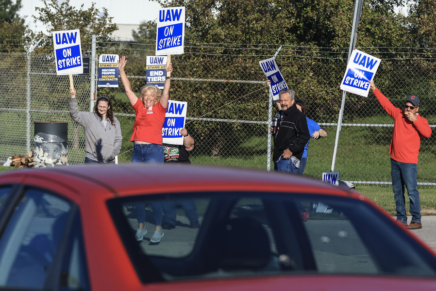 News Picture Story - 3rd, “UAW Strike”United Auto Workers including Cheryl Cullum, jumping, are on strike Friday, September 15, 2023, at the Stellantis Toledo Assembly Complex where Jeeps are made in Toledo, Ohio.  (Jeremy Wadsworth / The Blade)