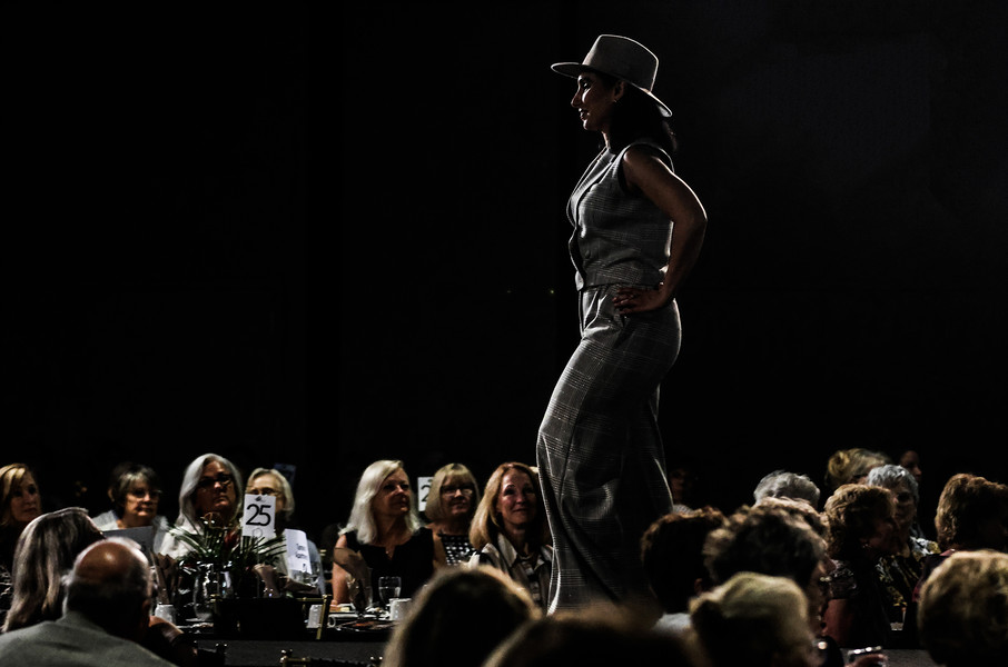1st - Photographer of the Year - Large Market A model wearing clothes from Vivian Kate struts down the runway during the Ability Center Fashion Show Wednesday, October 4, 2023, at The Pinnacle in Maumee.  (Jeremy Wadsworth / The Blade)