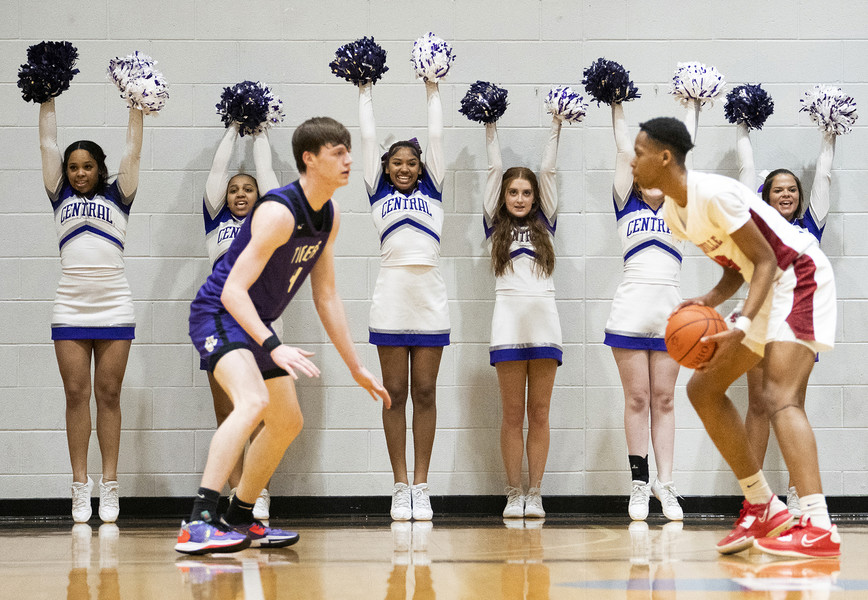 2nd - Photographer of the Year - Large Market Pickerington Central cheerleaders cheer while Westerville South’s Jujuan Ray looks for a pass around Pickerington Central’s Gavin Headings during their Division I boys basketball regional semifinal game at Ohio Dominican - Alumni Hall.  (Brooke LaValley / The Columbus Dispatch)