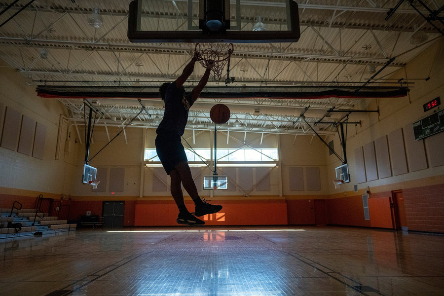 2nd - Photographer of the Year - Large Market Former South High School student Trevell Adams dunks in the Driving Park Community Recreation Center Gymnasium on the Near East Side.  (Brooke LaValley / The Columbus Dispatch)