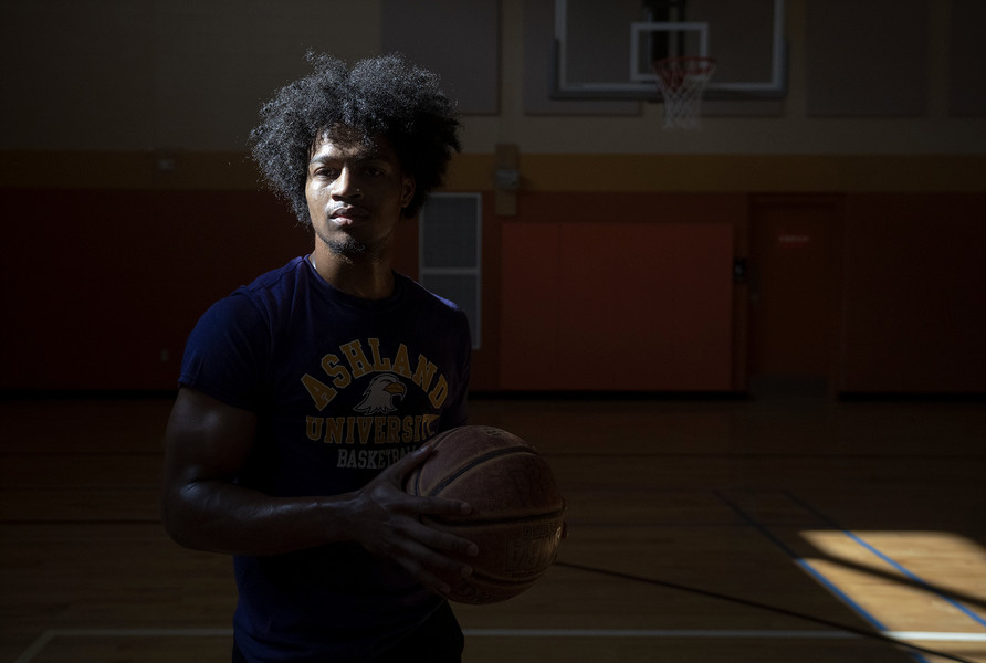 2nd - Photographer of the Year - Large Market Former South High School student Trevell Adams stands in the Driving Park Community Recreation Center Gymnasium.  Adams was shot in the leg while on his way to play in a summer league, he will start playing for Ashland University in the fall despite having a bullet still lodged in his leg.  (Brooke LaValley / The Columbus Dispatch)