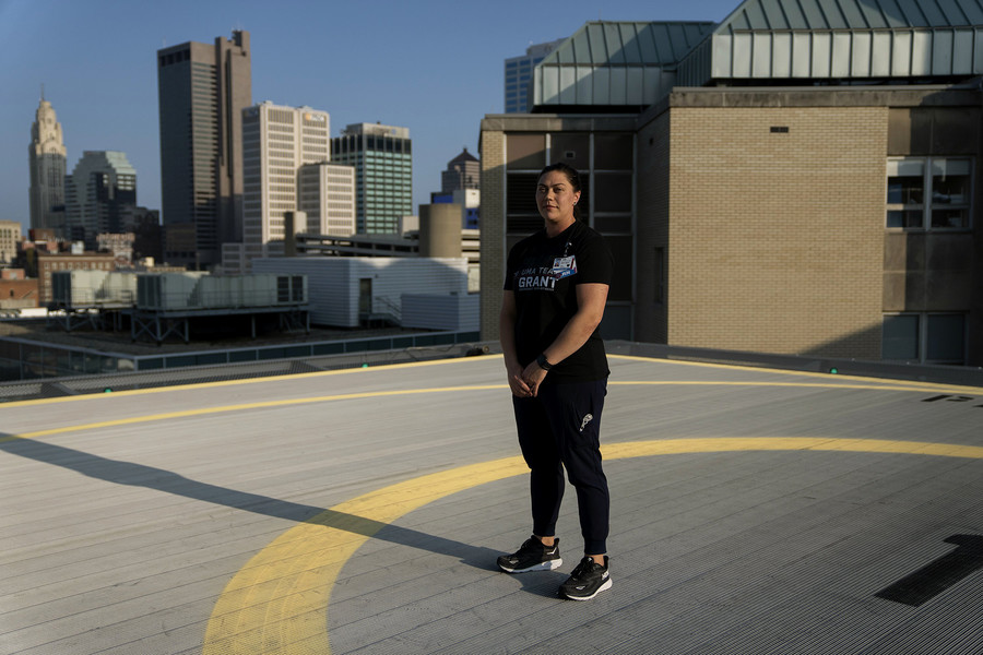 2nd - Photographer of the Year - Large Market Trauma Nurse Brittany Parker stands on the Helipad for Grant Hospital. She has been a nurse in the Emergency Department for five years, the Grant Trauma Center is a Level One trauma care facility and receives many transport patients who are injured from gun violence.  (Brooke LaValley / The Columbus Dispatch)