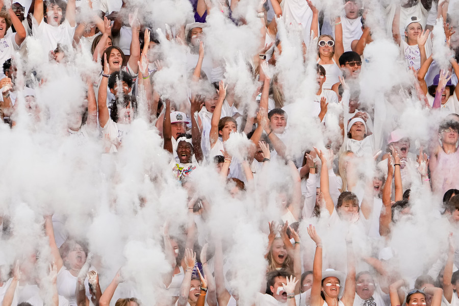 3rd - Photographer of the Year - Large Market Pickerington Central students throw powder in the air for the opening kickoff during the high school football game at Pickerington High School North. (Adam Cairns / The Columbus Dispatch)