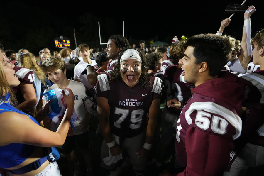 3rd - Photographer of the Year - Large Market Columbus Academy’s Sunil Santry (79) celebrates the 23-16 win over St. Charles during the high school football game at Columbus Academy. (Adam Cairns / The Columbus Dispatch)