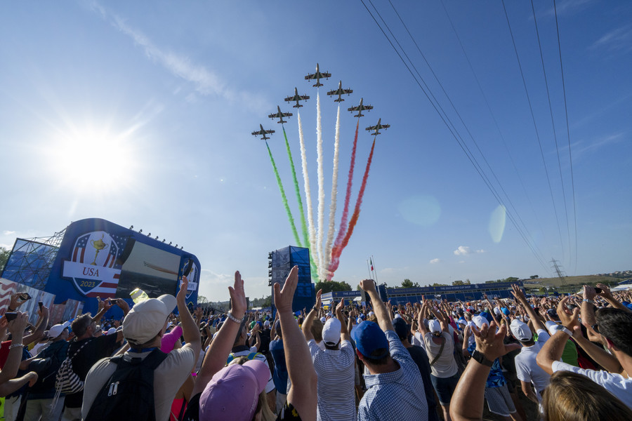 3rd - Photographer of the Year - Large Market The Ryder Cup is a matchup between players from the United States and Europe every four years in a golf tournament unlike any other. Country pride is on display with fans coming from all over the world. The 2023 tournament took place in Rome, Italy.  Airplanes make a flyover with the colors of the Italian flag during the opening ceremony for the Ryder Cup golf competition at Marco Simone Golf and Country Club. (Adam Cairns / The Columbus Dispatch)