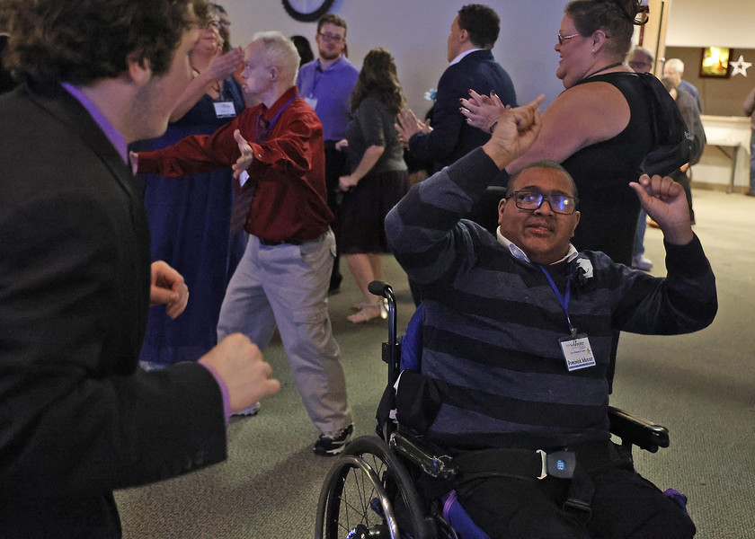 Award of Excellence - Photographer of the Year - Small Market Dominick Messer dances the night away at the Night to Shine prom Friday, Feb. 10, 2023 at the Laurencevlle Church of God.   (Bill Lackey / Springfield News-Sun)