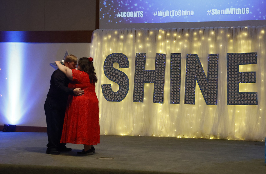 Award of Excellence - Photographer of the Year - Small Market While other guest are finishing dinner Matt VanWey and Katelyn Terry share a dance during the Night to Shine prom Friday, Feb. 10, 2023 at the Laurencevlle Church of God.   (Bill Lackey / Springfield News-Sun)