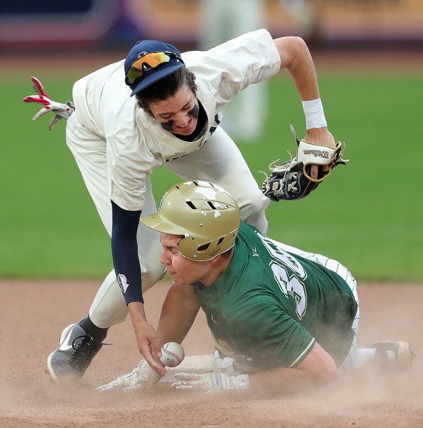 Sports Action - 2nd, “Safe at Second”St. Vincent - St Mary baserunner Daniel Krabill (bottom) collides with Hoban shortstop Leo Wilson as he steals second base during the first inning of a baseball game at Canal Park, Friday, May 12, 2023, in Akron. (Jeff Lange / Akron Beacon Journal)
