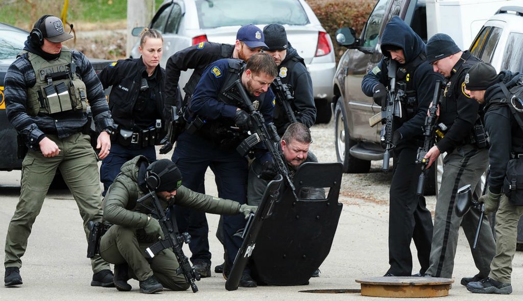Spot News - 1st, “Storm Drain Capture”A man with a gun who ran from a traffic stop Tuesday, March 14, 2023, was caught hiding in a storm drain on Kathleen Avenue in Dayton not far from East Siebenthaler Avenue and Riverside Drive.  (Marshall Gorby / Dayton Daily News)