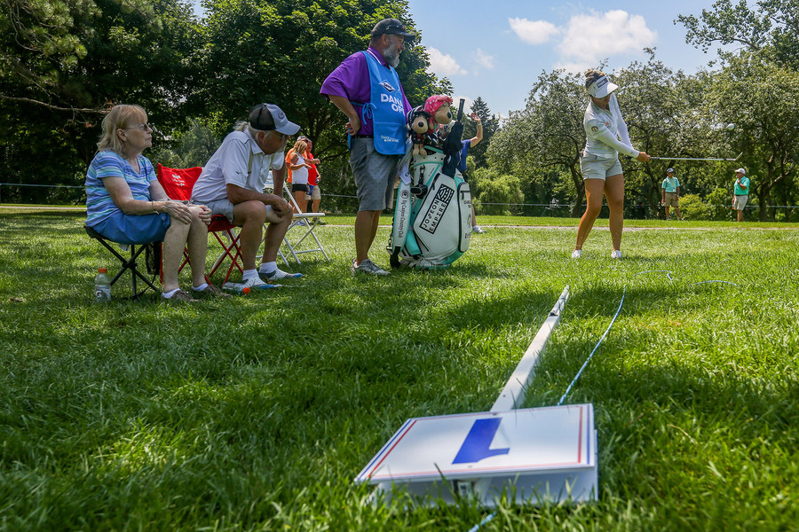 Award of Excellence - Ron Kuntz Sports Photographer of the Year Gabrielle Then chips from out of bounds on the first hole during the second round of the Dana Open at Highland Meadows Golf Club in Sylvania on Friday, July 14, 2023.  (Rebecca Benson / The Blade)