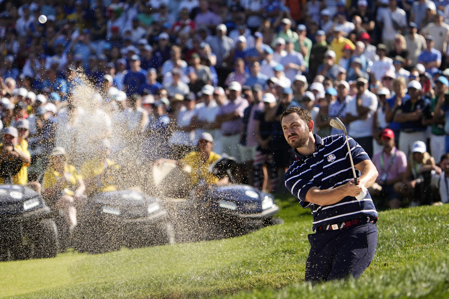 Sports Picture Story - 1st, “Ryder Cup”Team USA golfer Patrick Cantlay hits out of the sand trap on the sixteenth hole during day one foursomes round for the 44th Ryder Cup golf competition at Marco Simone Golf and Country Club.  (Adam Cairns / The Columbus Dispatch)