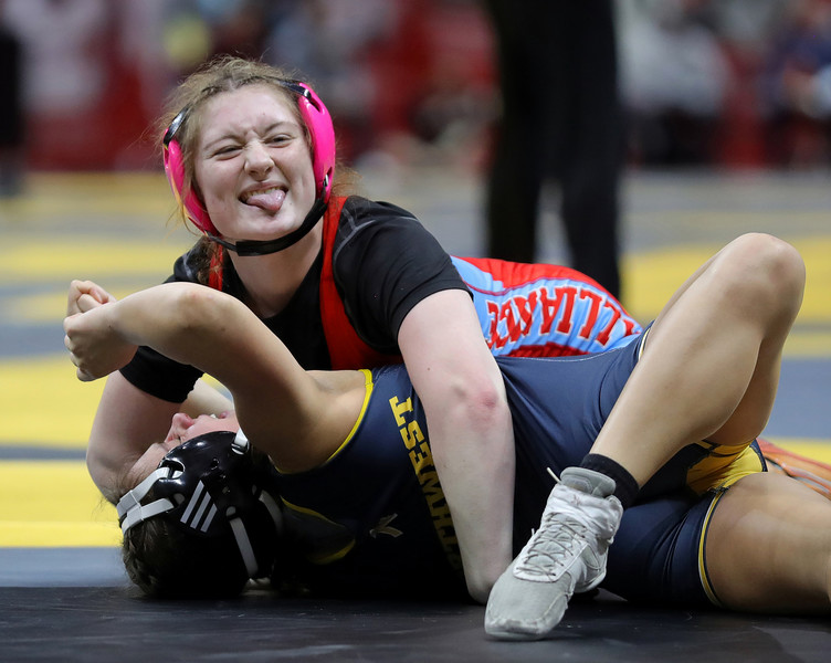 Sports Picture Story - 2nd, “Girls State Wrestling”Abigail Mozden of Alliance, top, celebrates as she pins Olivia Gilliand of Cincinnati Northwest during their 130-pound match in the OHSAA  state wrestling tournament at the Jerome Schottenstein Center, Friday, March 10, 2023, in Columbus, Ohio. (Jeff Lange / Akron Beacon Journal)