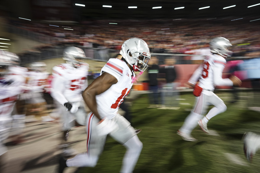 Sports Picture Story - 3rd, “Marvin Harrison Jr. ”Ohio State wide receiver Marvin Harrison Jr. (18) takes the field for the first half of the NCAA football game against the Wisconsin Badgers at Camp Randall Stadium.  (Adam Cairns / The Columbus Dispatch)