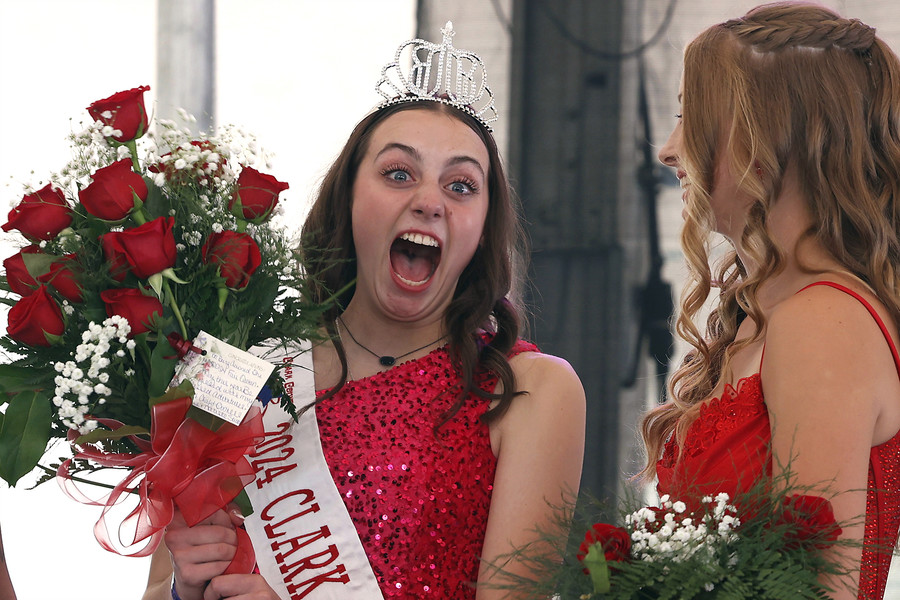 First Place, Photographer of the Year - Small Market - Bill Lackey / Springfield News-SunEllen Getz makes a face of disbelief towards her family as she's presented with a crown, sash and flowers after being announced as the 2024 Clark County Fair Queen on the first day of the fair Friday, July 19, 2024. 