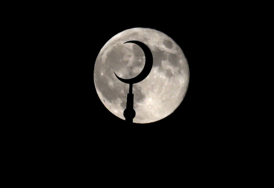 First Place, Photographer of the Year - Small Market - Bill Lackey / Springfield News-SunThe super moon rises behind the Miami Valley Islamic Association of Springfield Thursday, Oct. 17, 2024. 