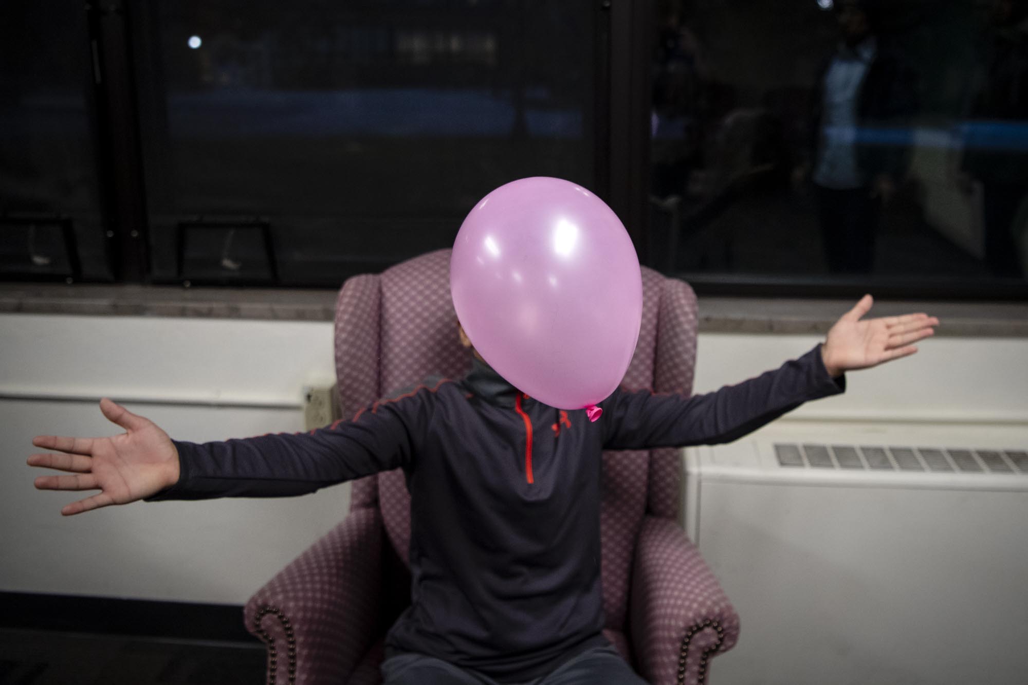 At his twelfth birthday party, Abood pops a balloon. Members of the Kent State chapter of the Palestinian Children’s Relief Fund, the organization that brought Abood to the United States to receive free treatment, threw the party. By the end of the night, Abood popped all the balloons in the room, laughing and making jokes each time.