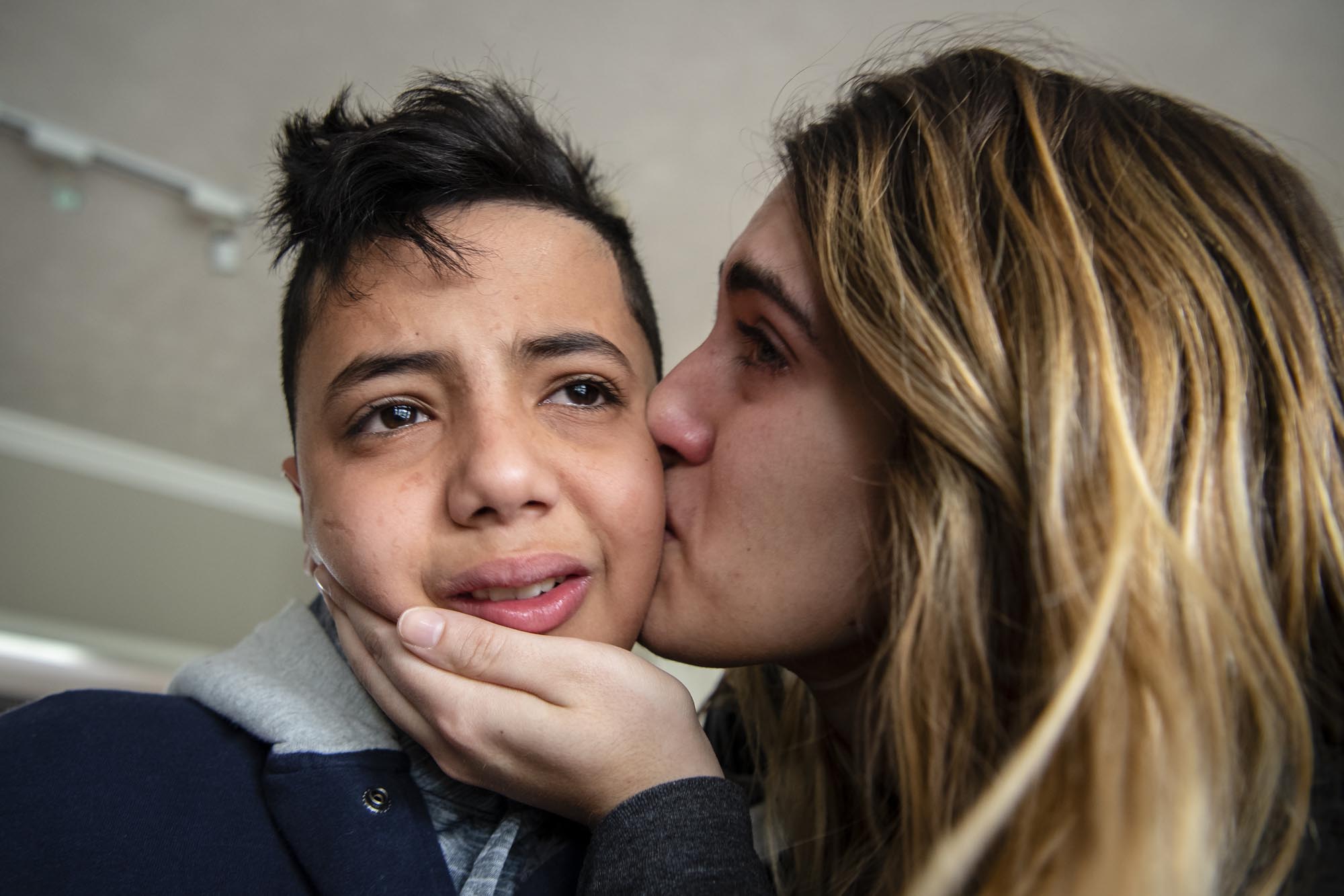 Noor Bahhur tearfully kisses Abood goodbye before her father drove him to the airport, telling him to stay in touch. For the last few weeks of his time in the United States, Abood lived with the Bahhur family, growing very close to Noor and her brother Omar. “I think he saw us as siblings,” Noor said. “For a boy who’s 11, who lost his leg, he never had a dull moment. I’ve never seen him without a smile — even though he’s thousands of miles away from his family.”