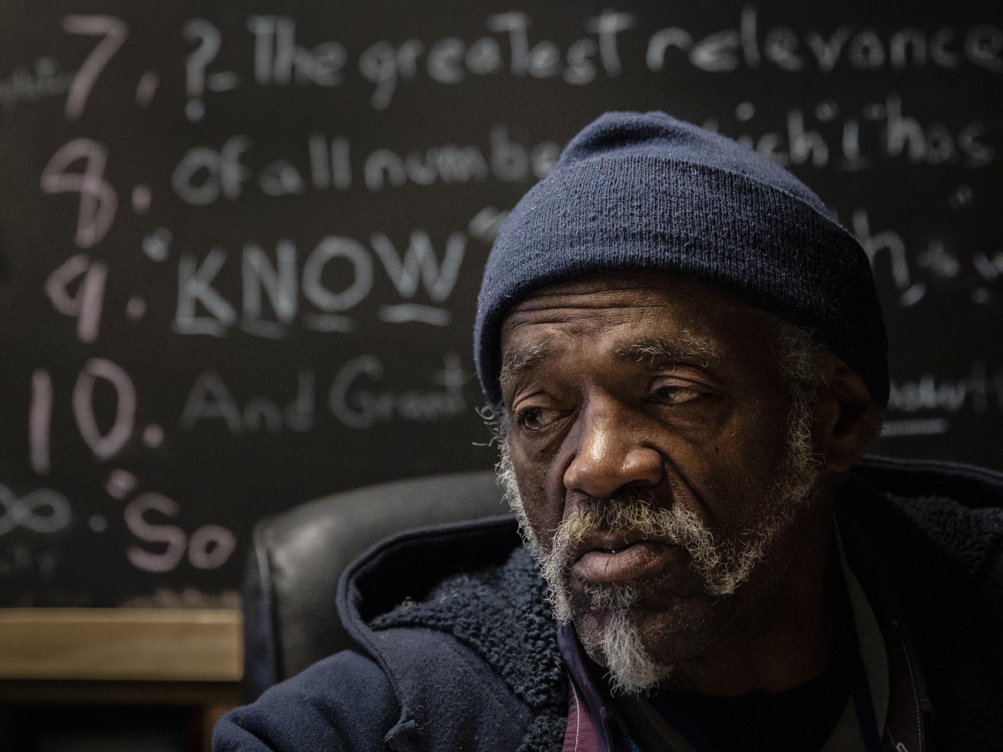 Paul Buchanan, 73, sits in his workshop at Tent City. Paul suffers from severe arthritis, and became homeless when he lost his home in a fire. He now runs maintenance for Tent City. "Homeless, it's not hopeless. I'm working on getting another place right now. They can evict me from a house, an apartment, my front porch, but there ain't no way in hell I'm getting evicted from no damn tent," Paul said when discussing ongoing contention between Tent City and the City of Akron.