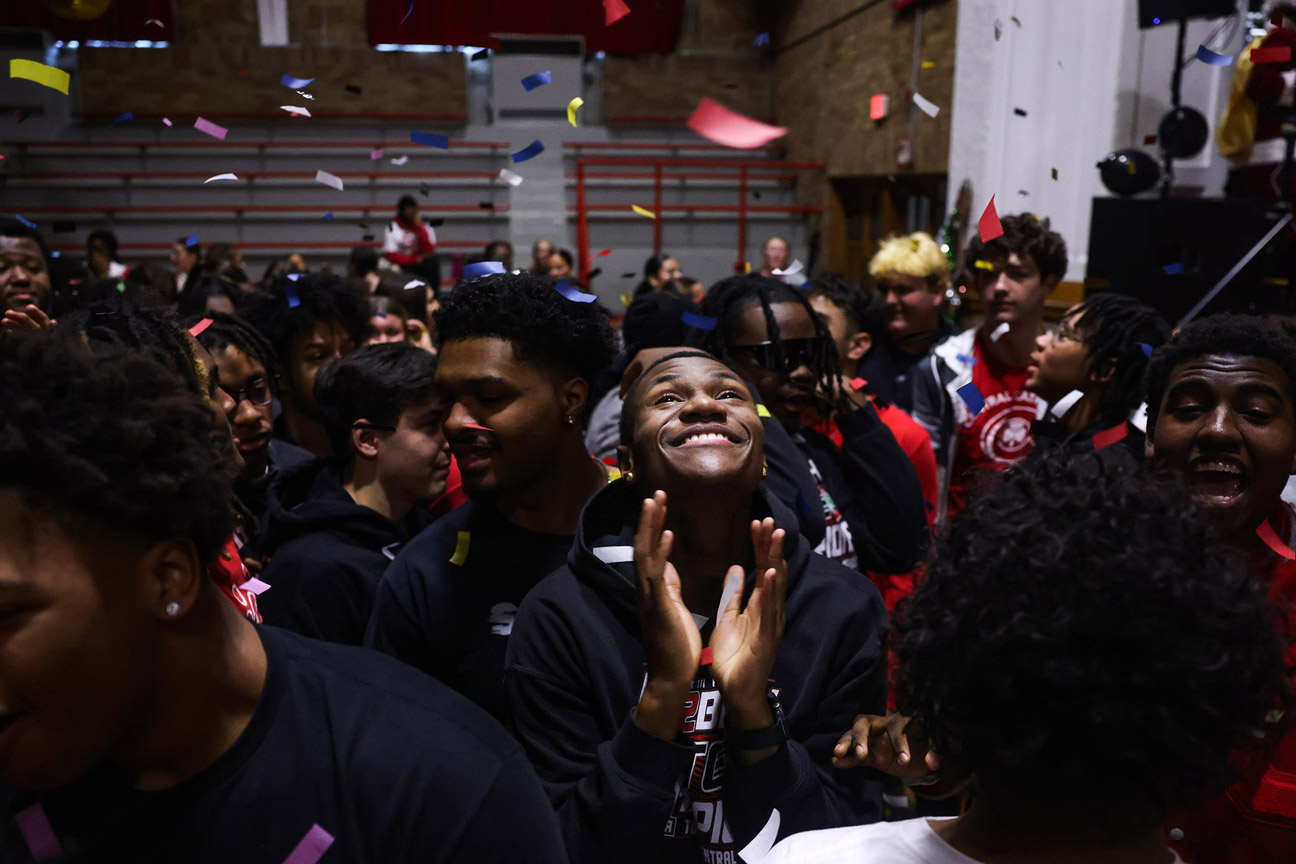December - 2nd place spot news - Tyler Darling waves a Black Lives Matter flag among motorcycle tire smoke on High Street during a protest that started at the Franklin County Sheriff's Office building in Columbus. 500 protesters were demanding justice for Casey Goodson Jr. after Deputy Jason Meade fatally shot Goodson at his home in the Northland neighborhood on the city's northeast side. Kyle Robertson / The Columbus Dispatch